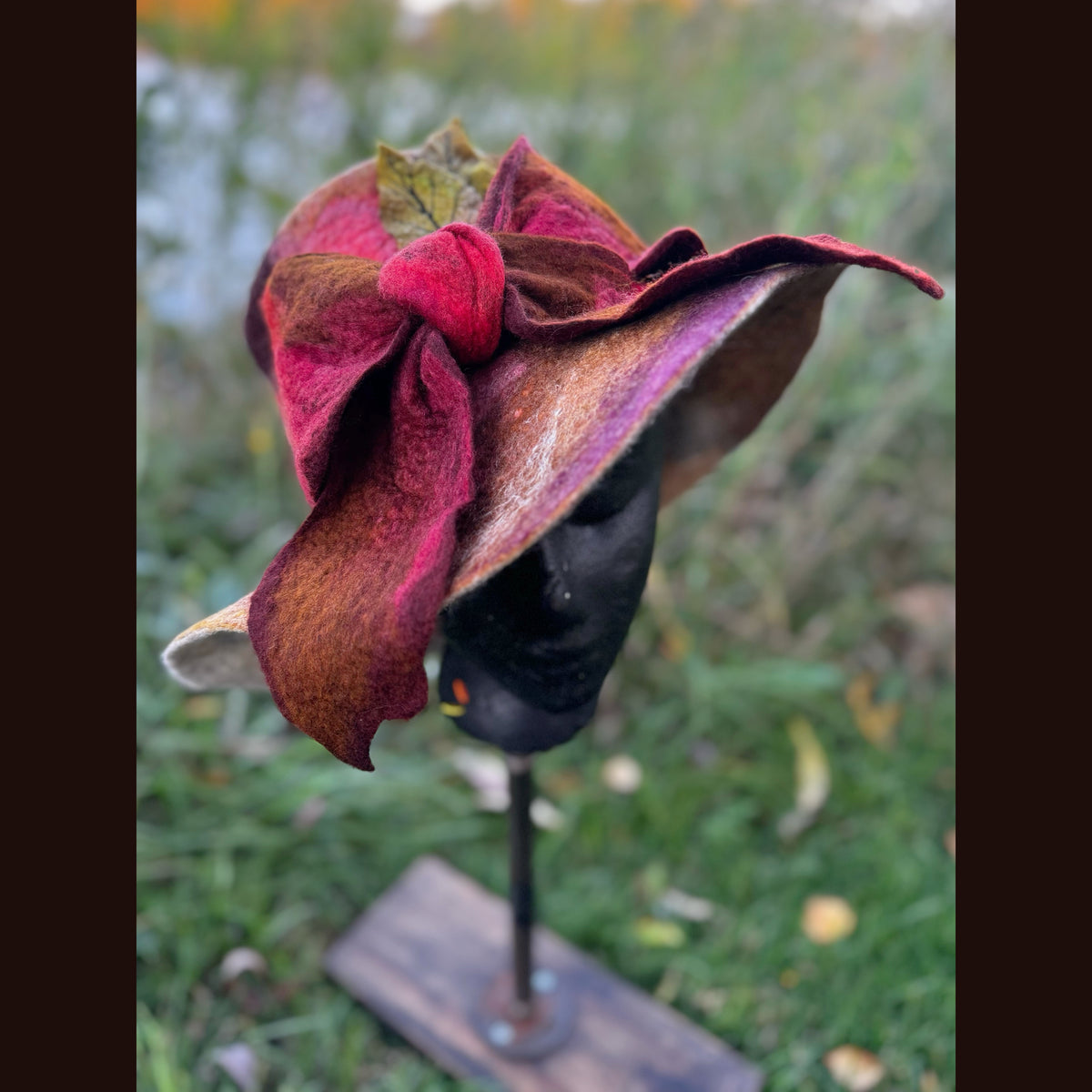 Felted top hat with leaves 23 3/4” medium