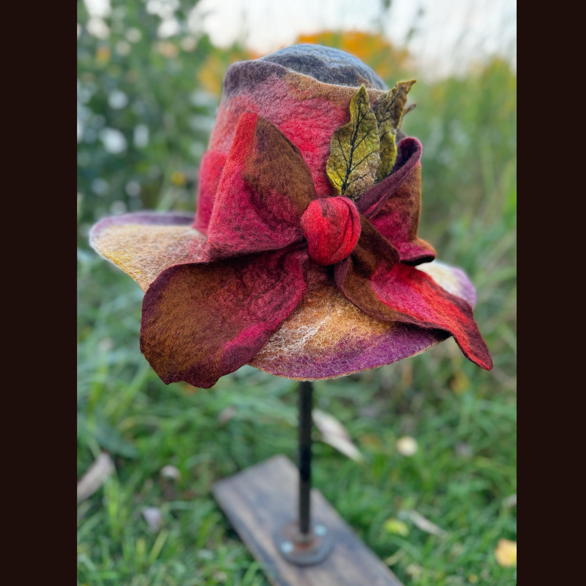 Felted top hat with leaves 23 3/4” medium