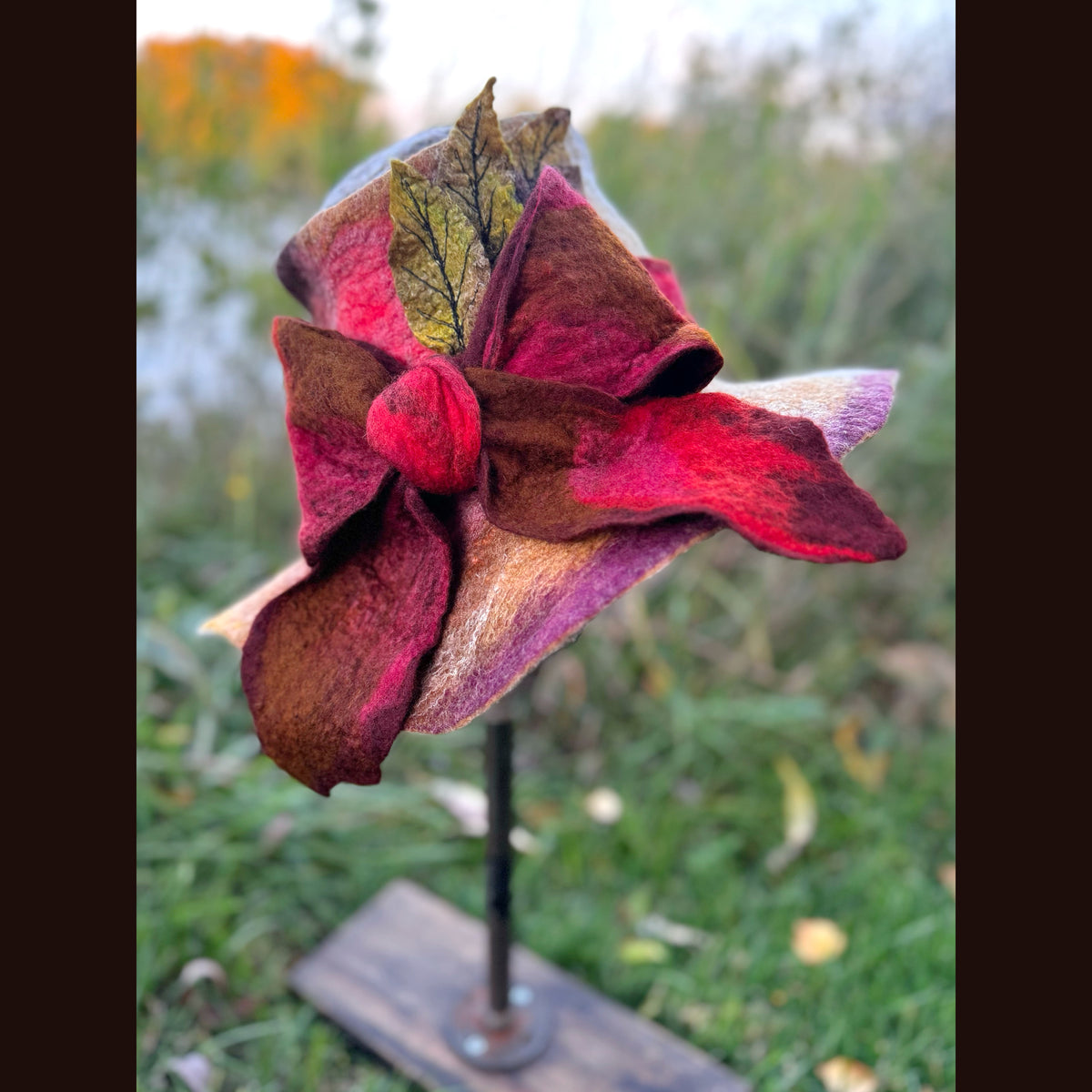 Felted top hat with leaves 23 3/4” medium