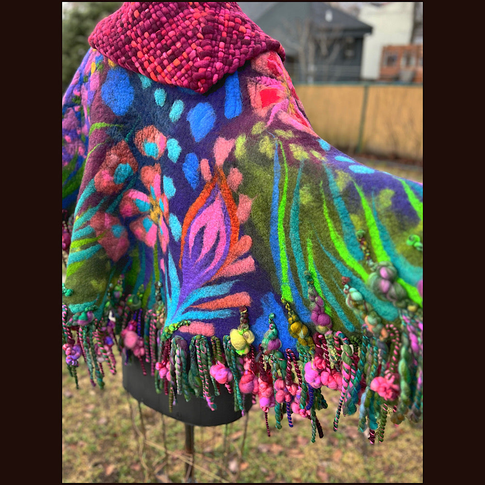 Felted cape with woven collar