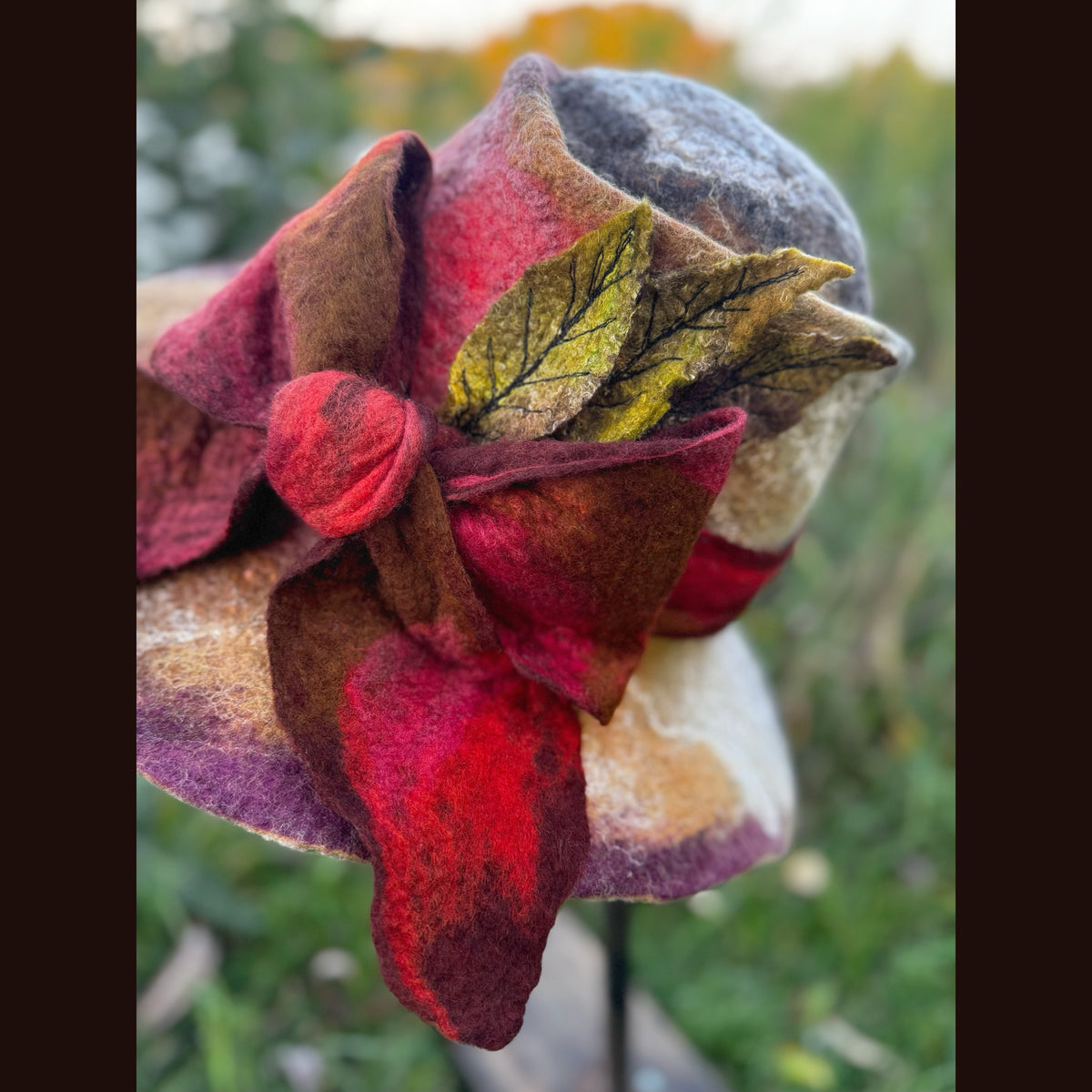 Felted top hat with leaves 23 3/4” medium