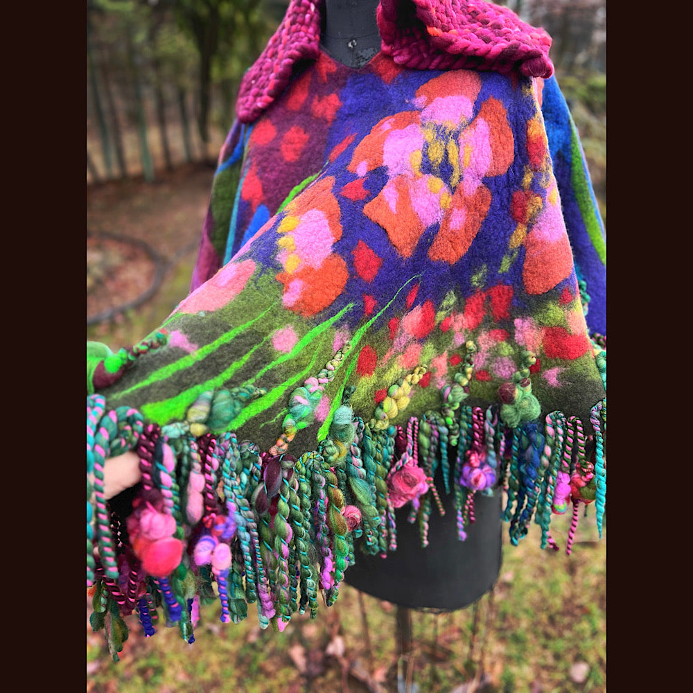 Felted cape with woven collar