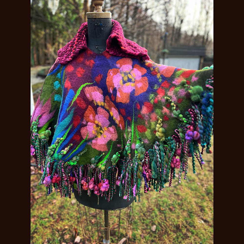 Felted cape with woven collar