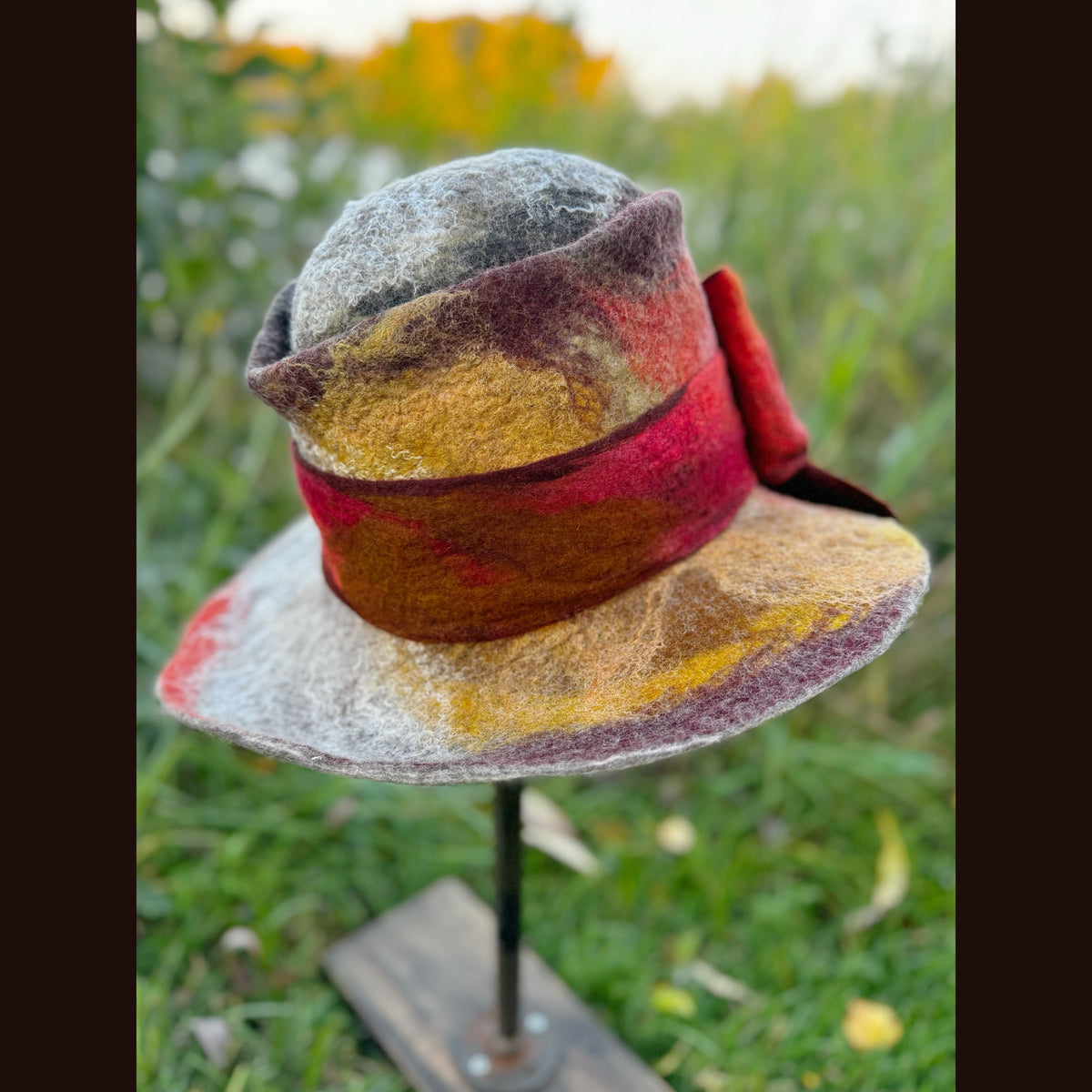 Felted top hat with leaves 23 3/4” medium
