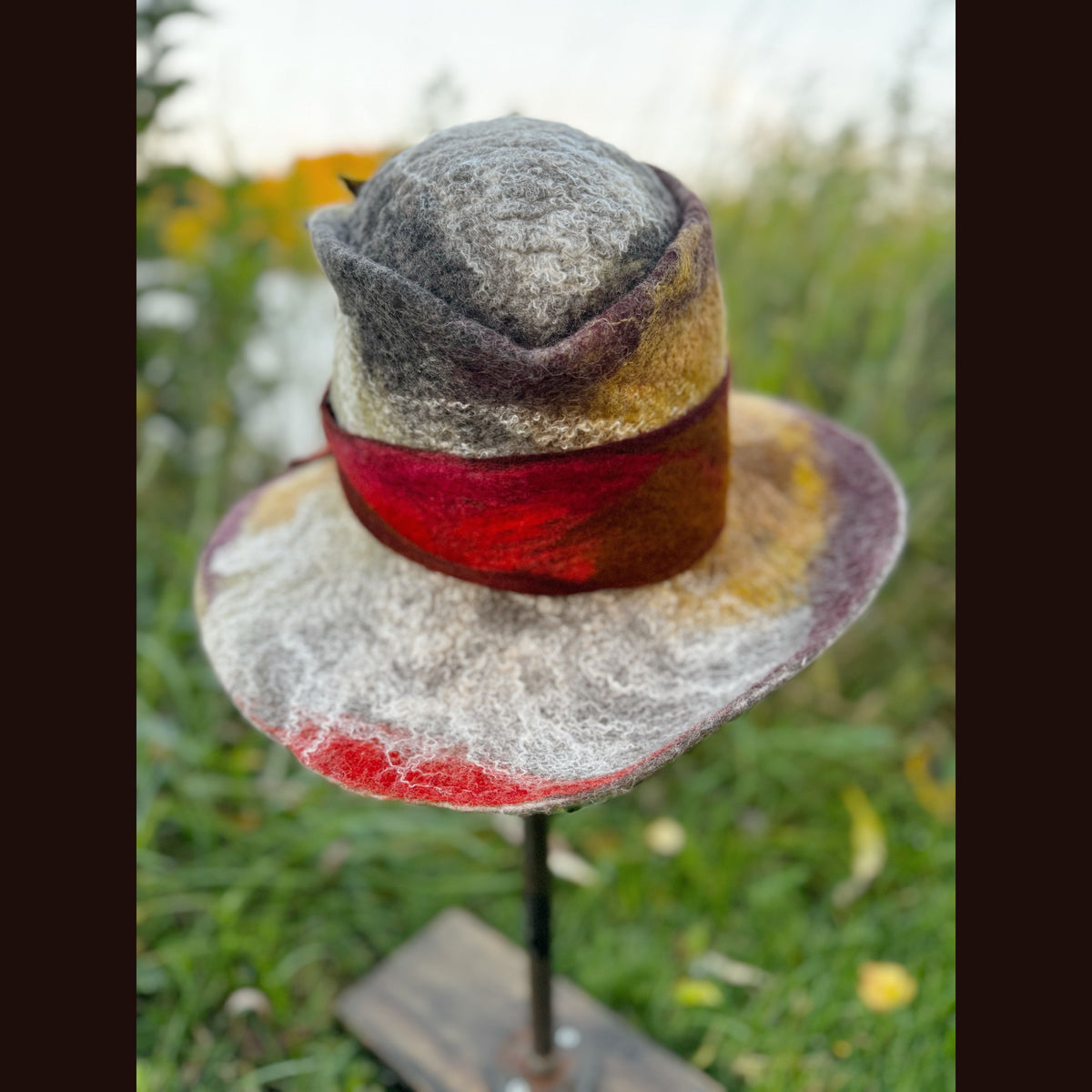Felted top hat with leaves 23 3/4” medium