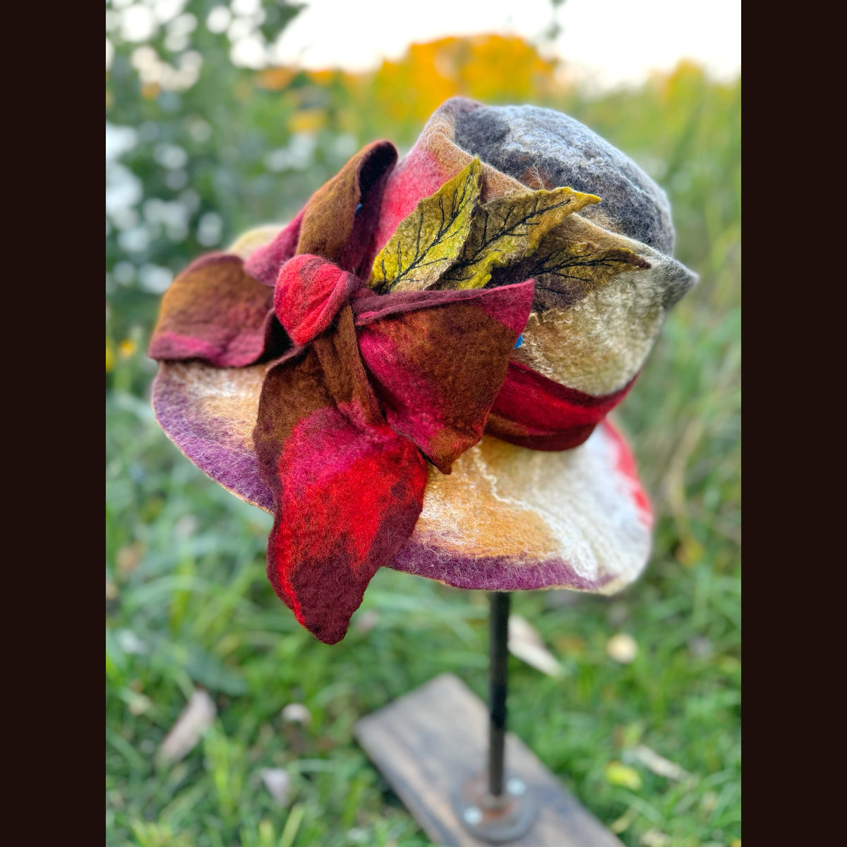 Felted top hat with leaves 23 3/4” medium