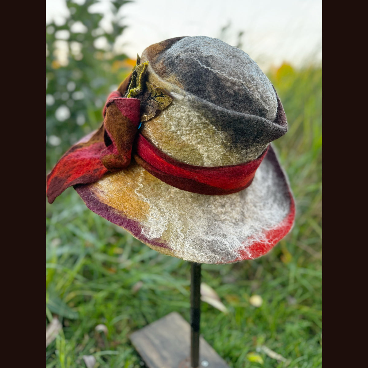 Felted top hat with leaves 23 3/4” medium