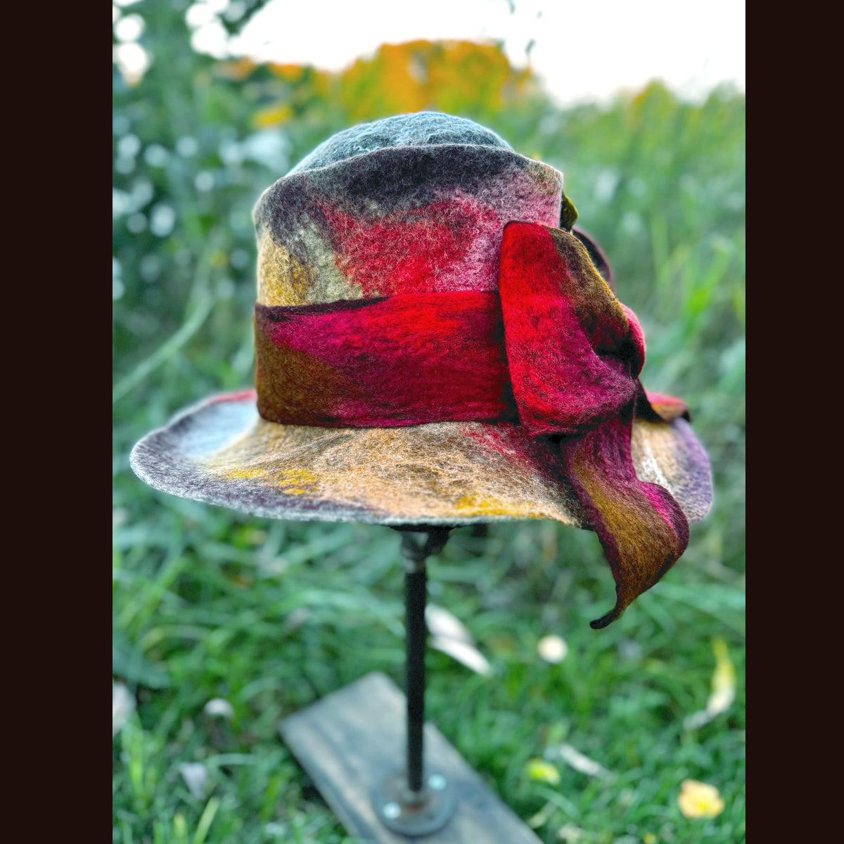 Felted top hat with leaves 23 3/4” medium