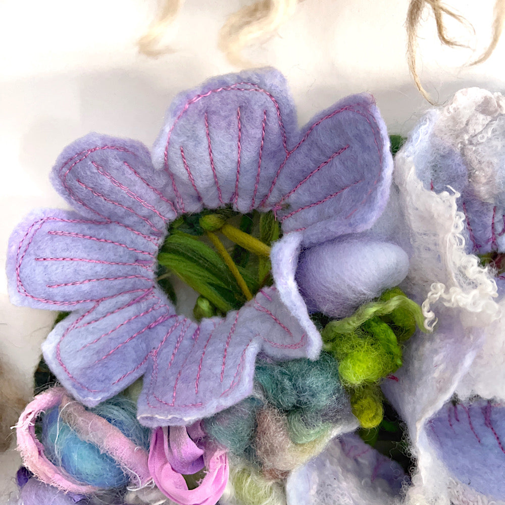 Floral woven tapestry wall decor 11” X 21”