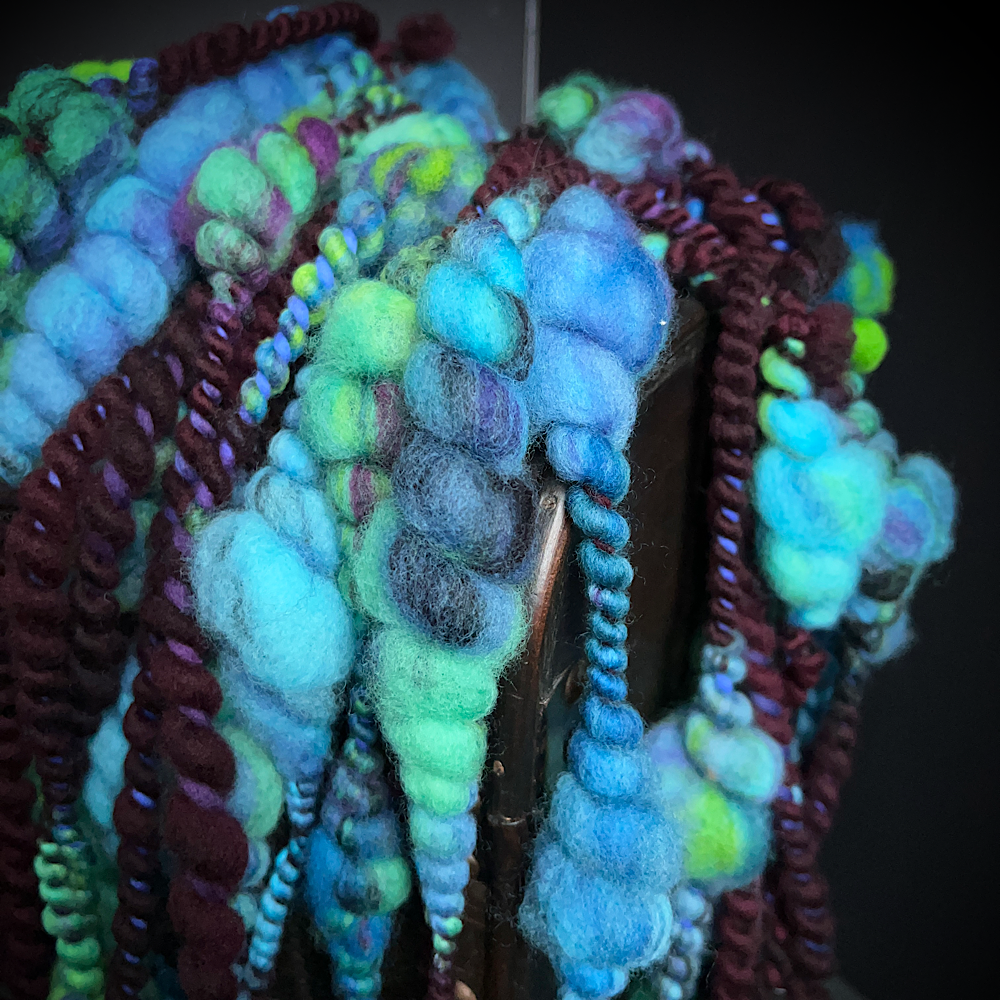 Turquoise thick and thin art yarn