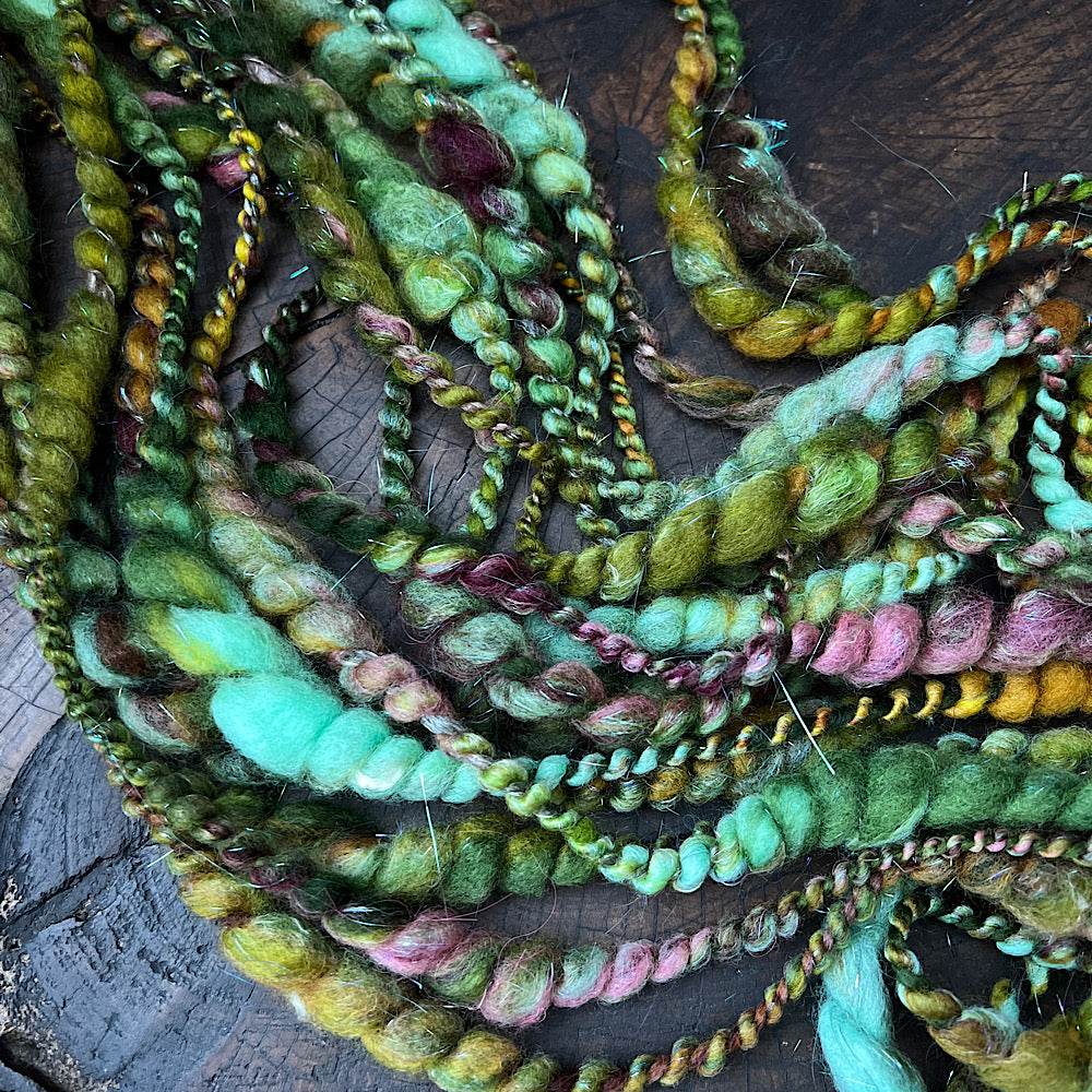 Fluffy spiral in mermaid green