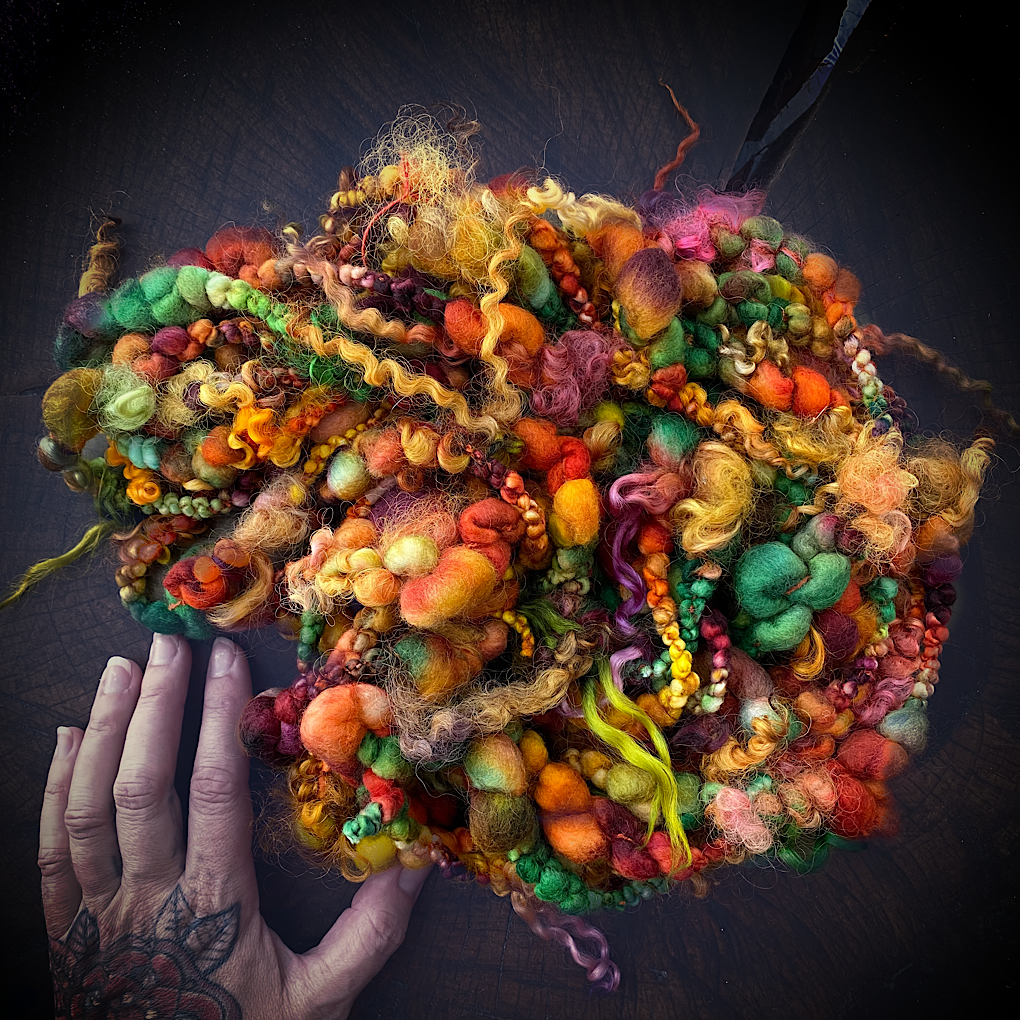 Cornucopia boucle art yarn with locks