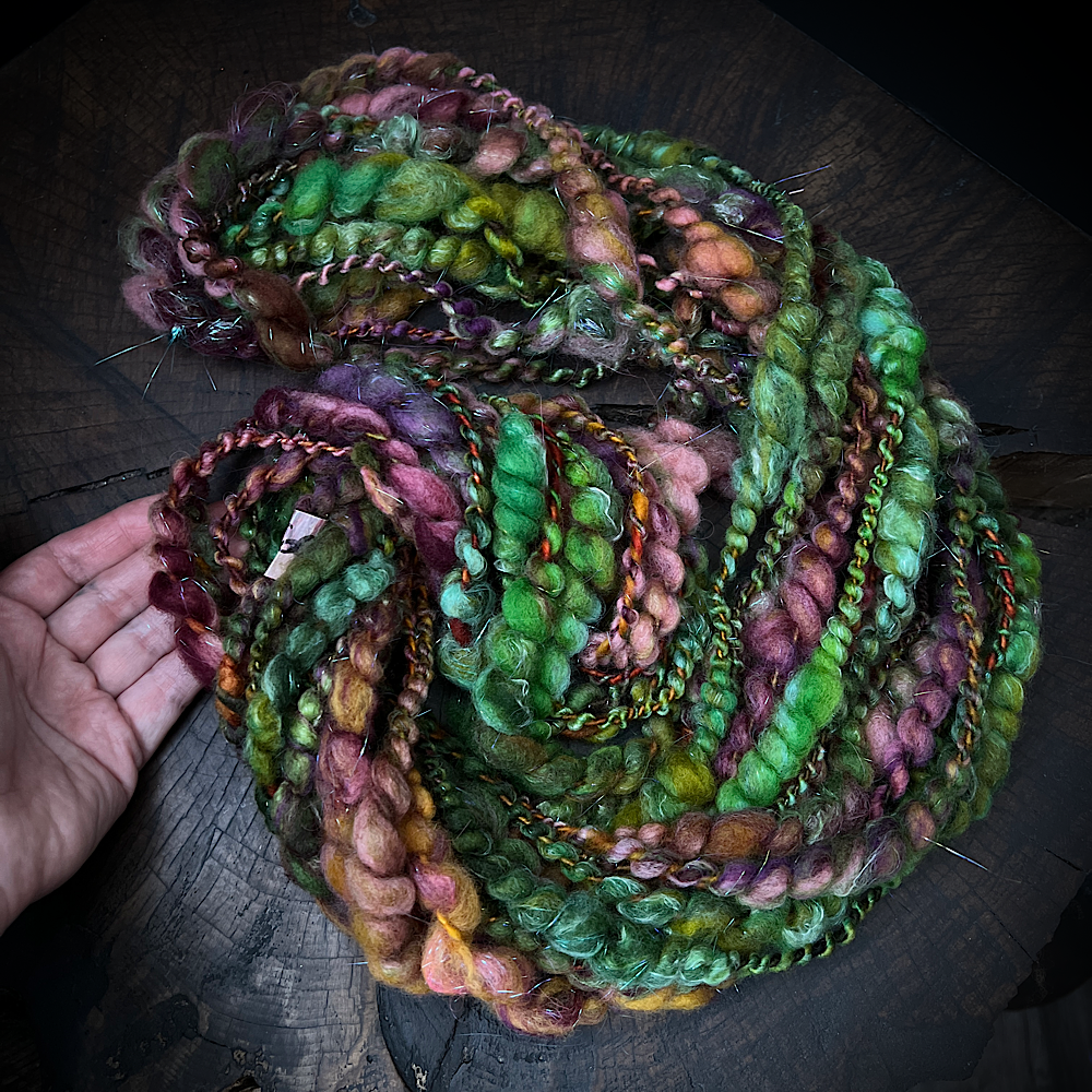 Fluffy spiral in mermaid green