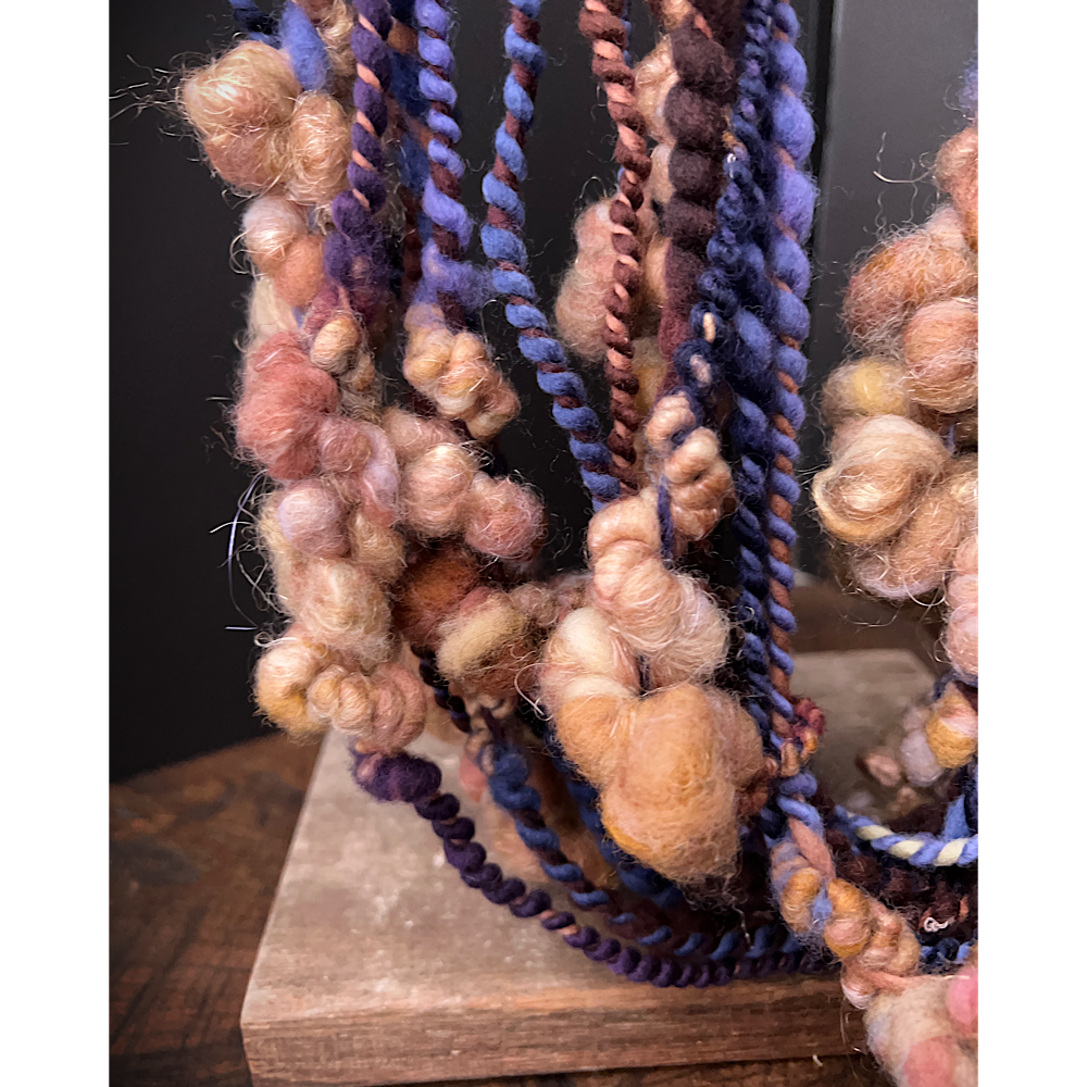 Large assortment of art yarns for weavers and knitters