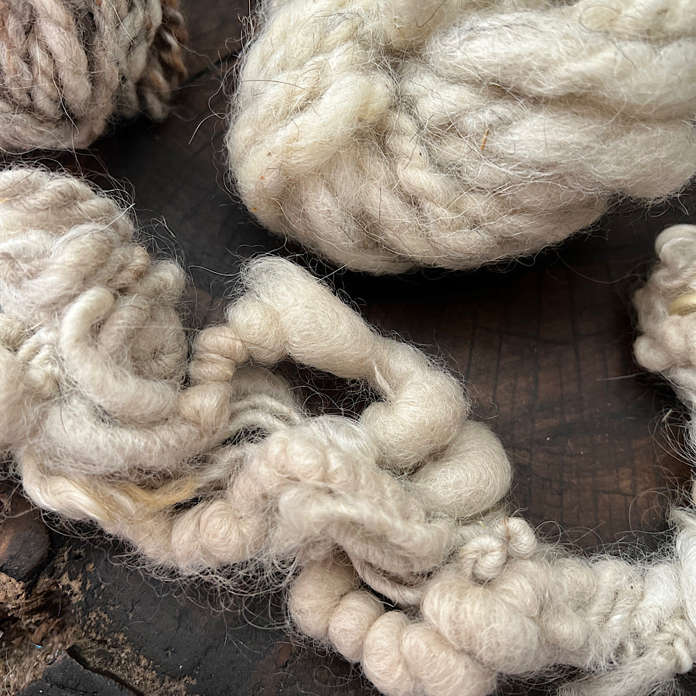 Set of rustic yarns from my spinning debuts