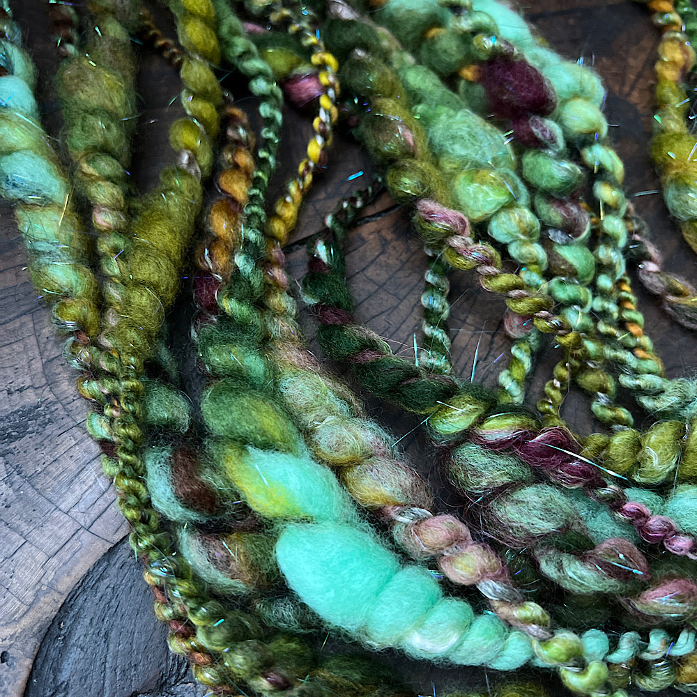 Fluffy spiral in mermaid green