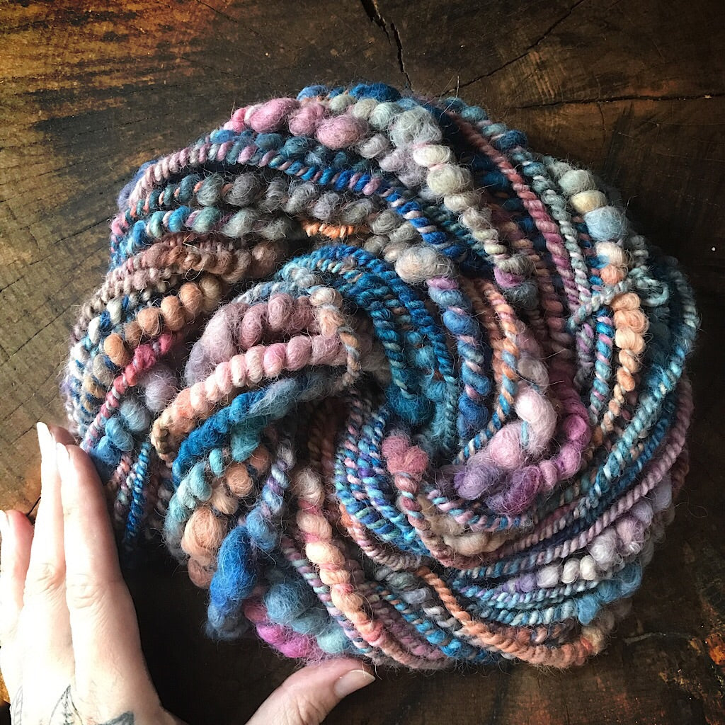 Pink sky alpaca yarn