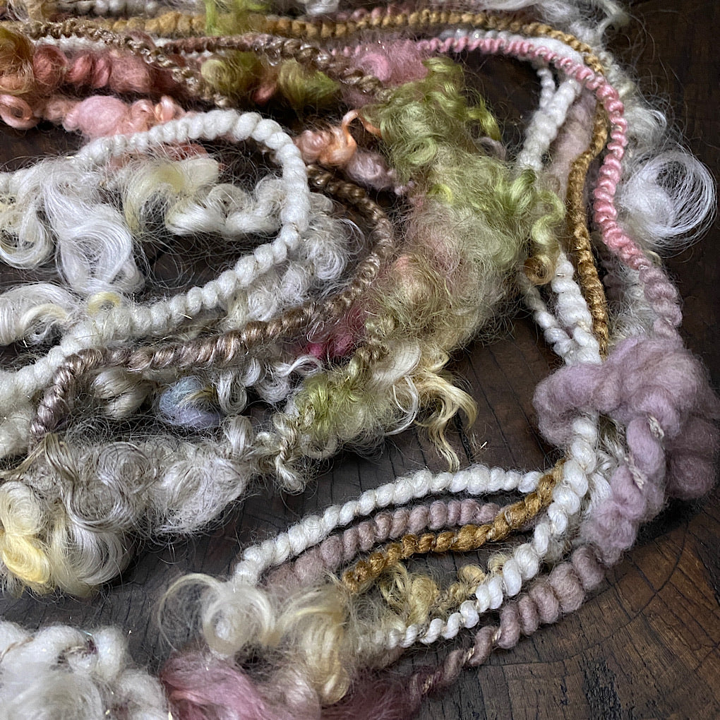 The Snow Rose Art yarn mini skein