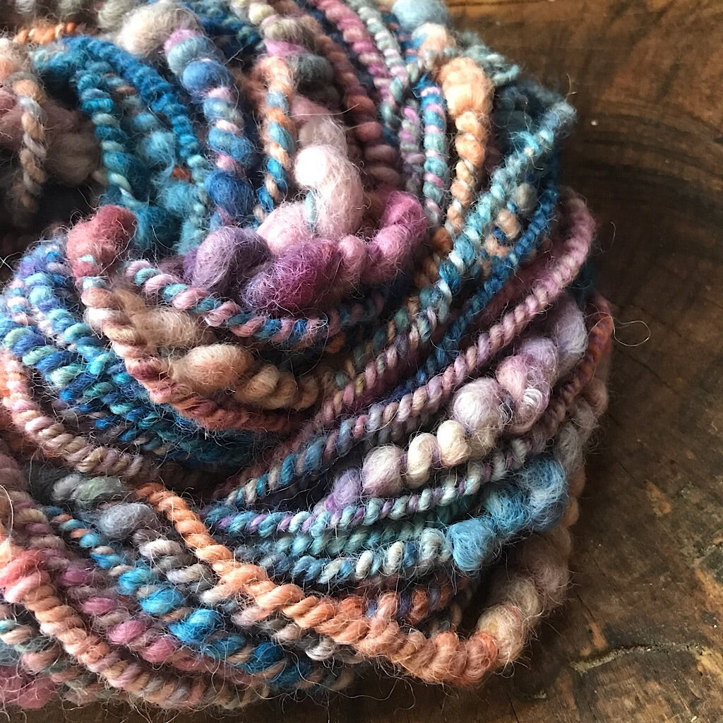 Pink sky alpaca yarn