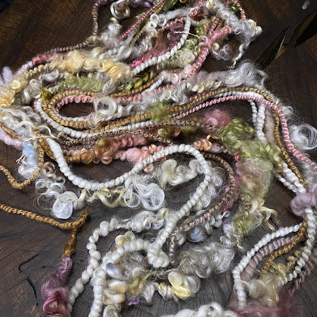 The Snow Rose Art yarn mini skein