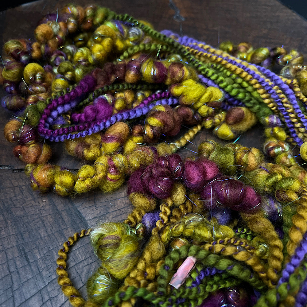 Roasted aubergines art yarn