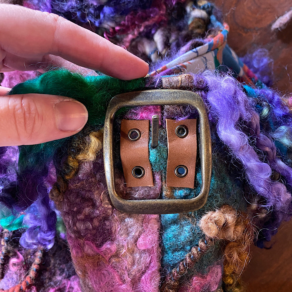 Felted bag with woven strap