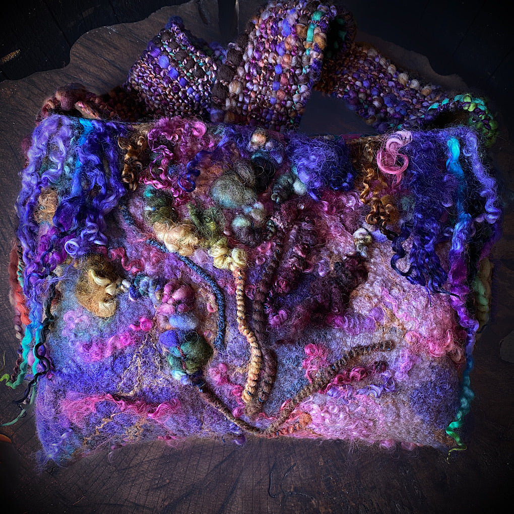 Felted bag with woven strap