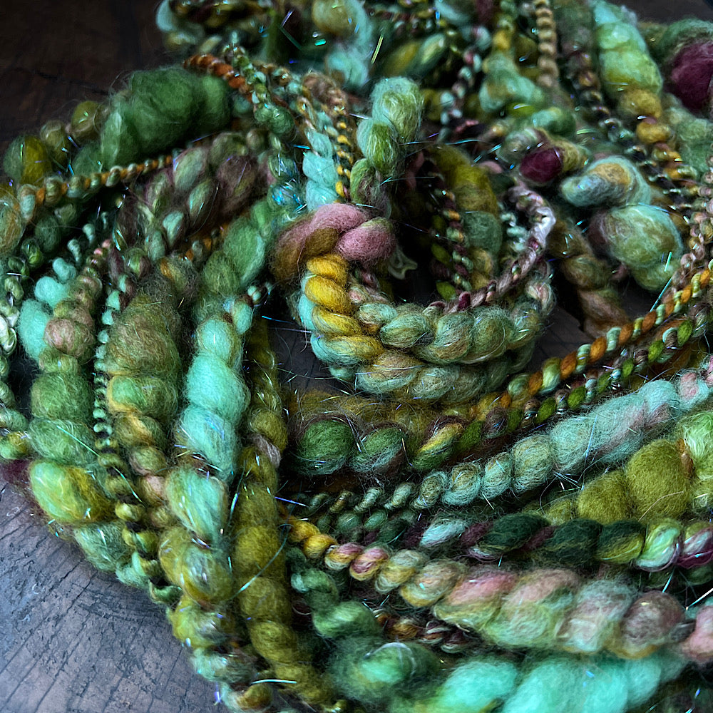 Fluffy spiral in mermaid green