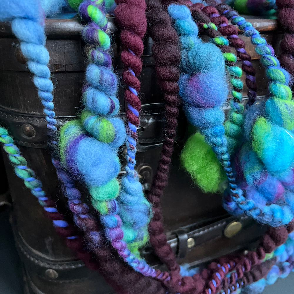 Turquoise thick and thin art yarn