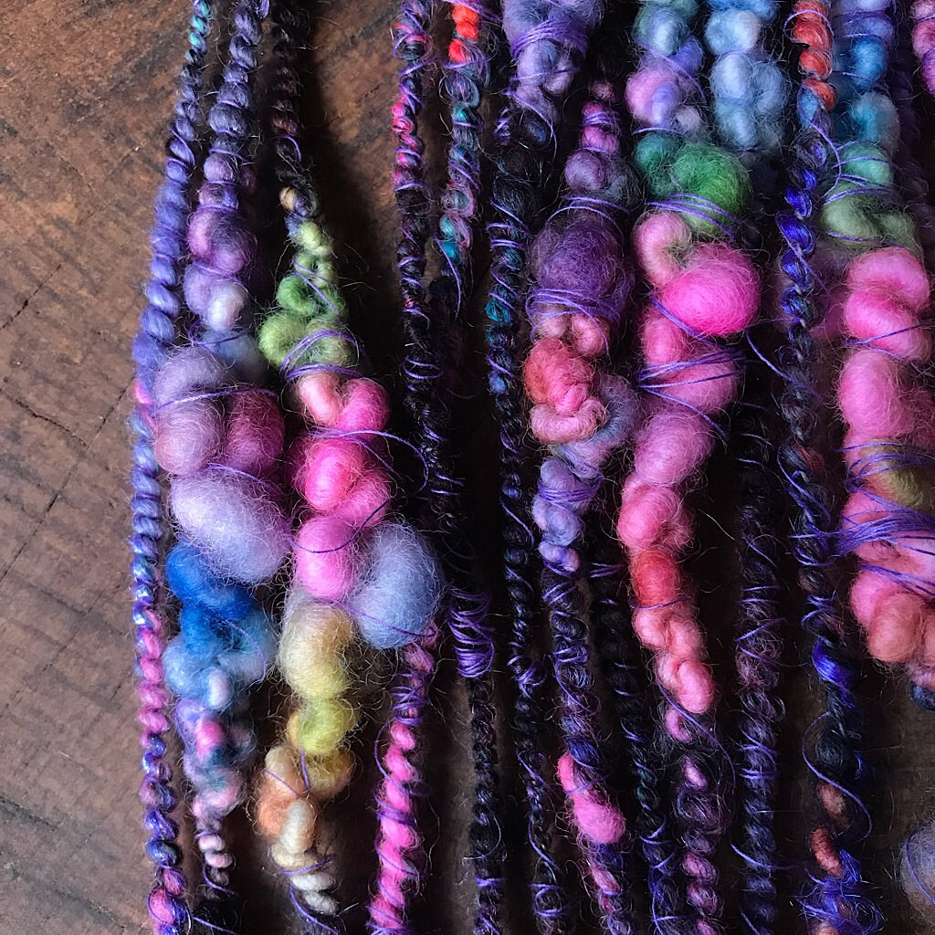 Black rainbow art yarn