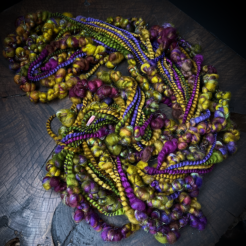 Roasted aubergines art yarn