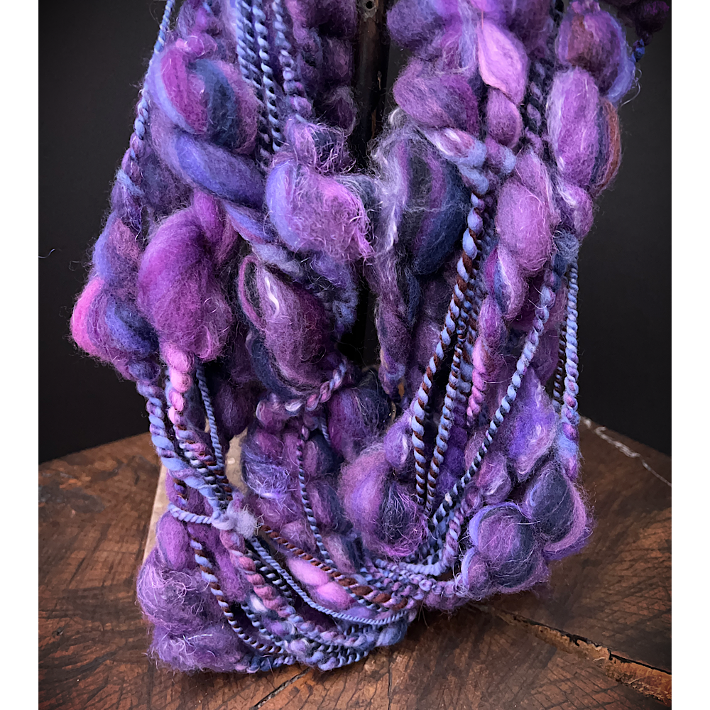 Large assortment of art yarns for weavers and knitters