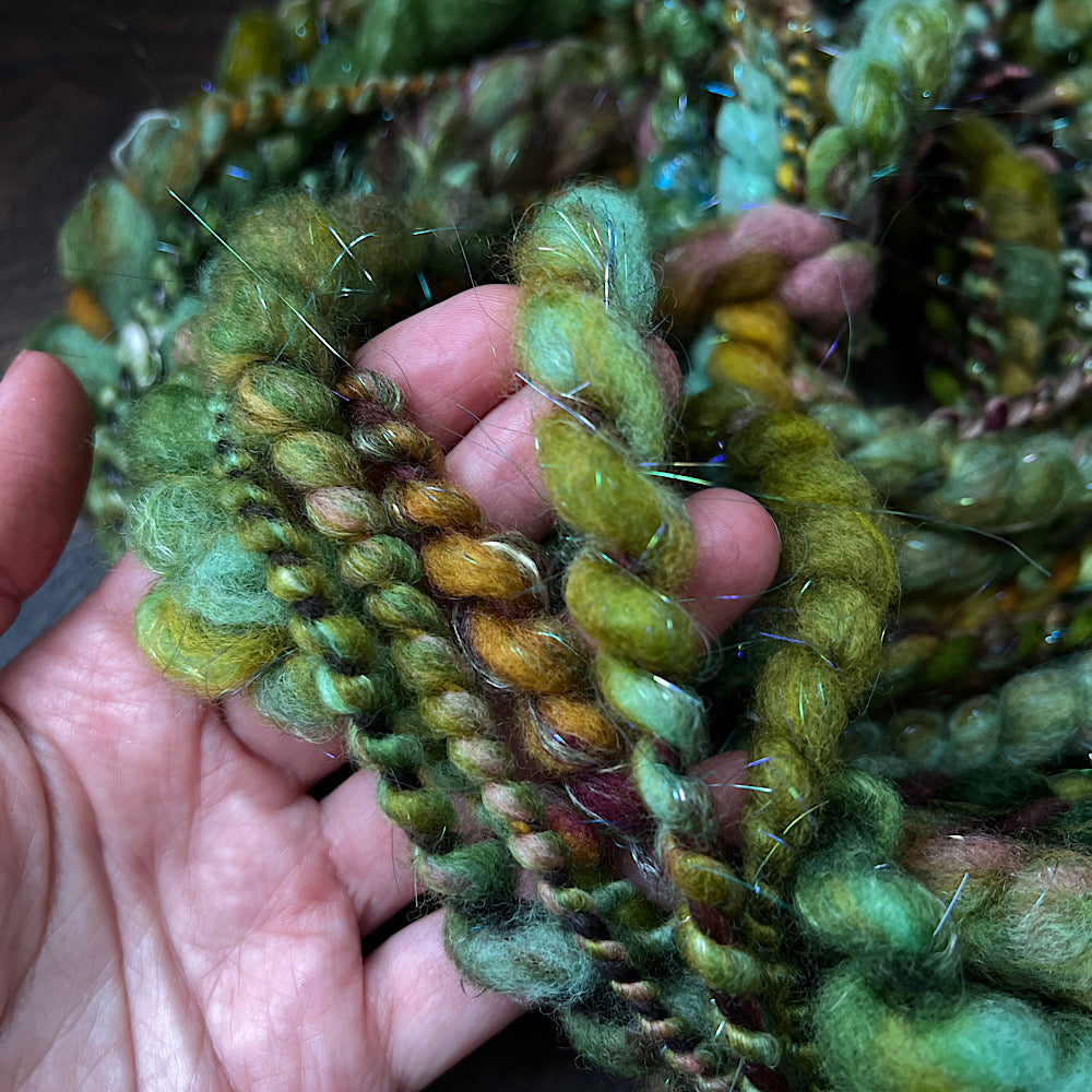 Fluffy spiral in mermaid green