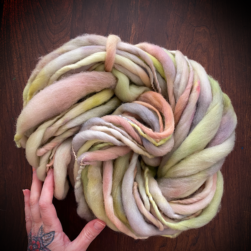 Earthy green thick and thin yarn