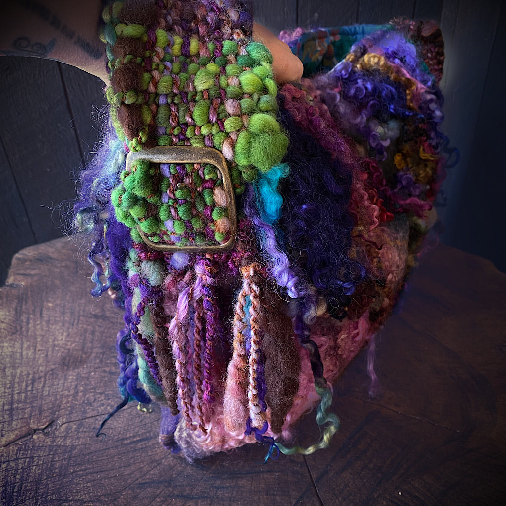 Felted bag with woven strap