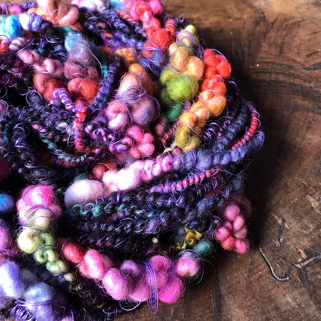 Black rainbow art yarn