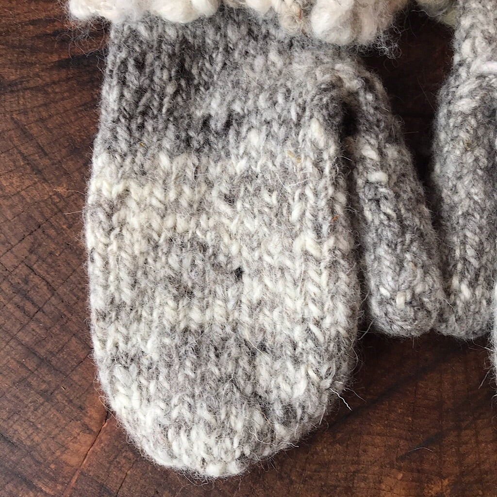 Grey knitted mittens
