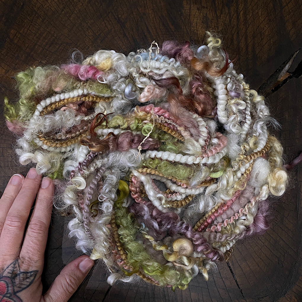 The Snow Rose Art yarn mini skein