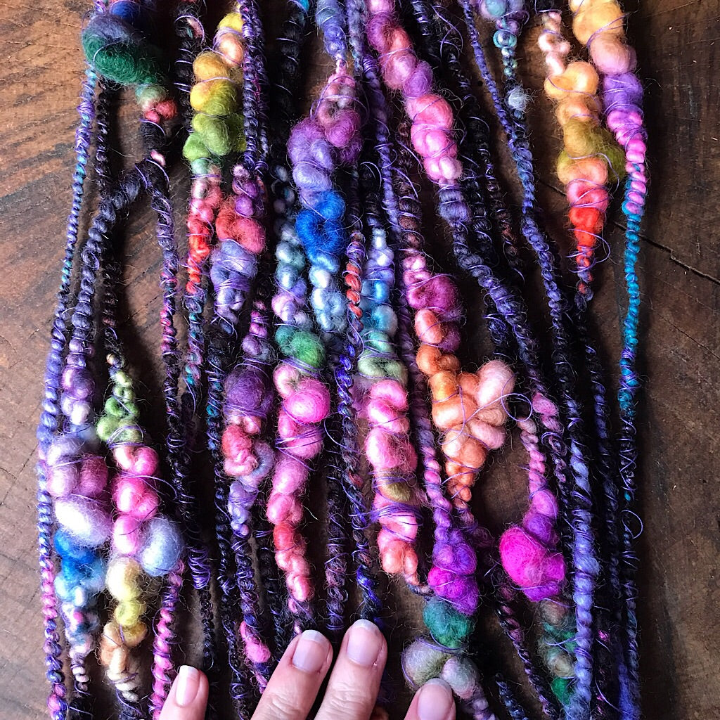 Black rainbow art yarn