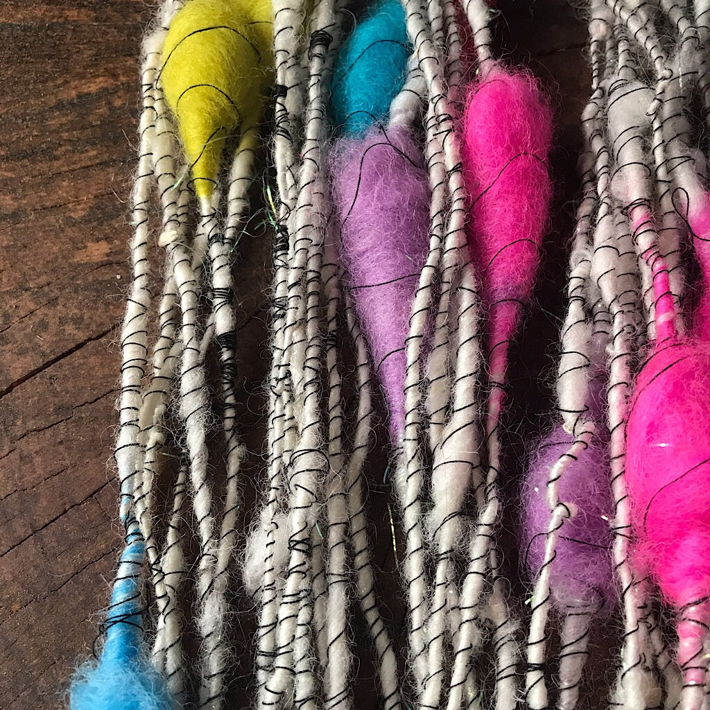 Rainbow cocoons Art yarn