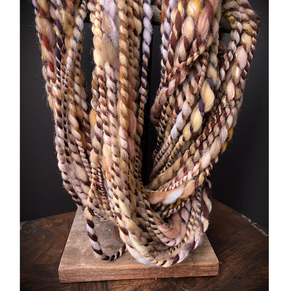 Large assortment of art yarns for weavers and knitters