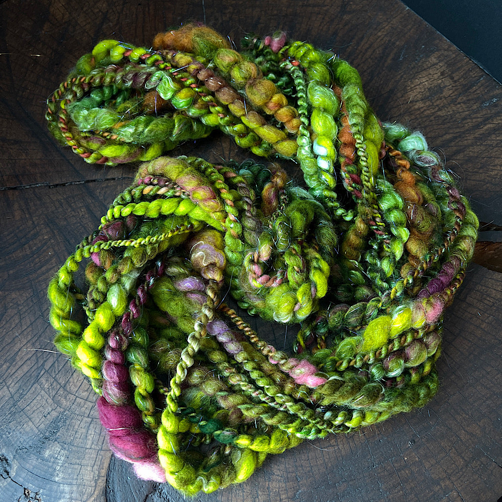 Fluffy spiral in woodland green