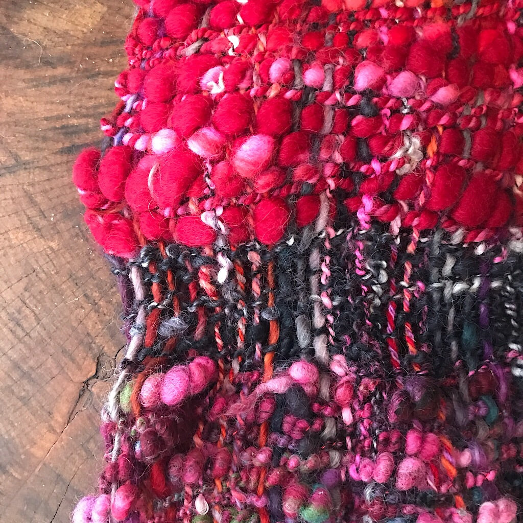 Red and black woven scarf