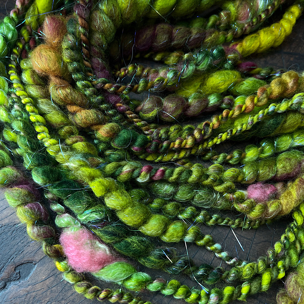 Fluffy spiral in woodland green