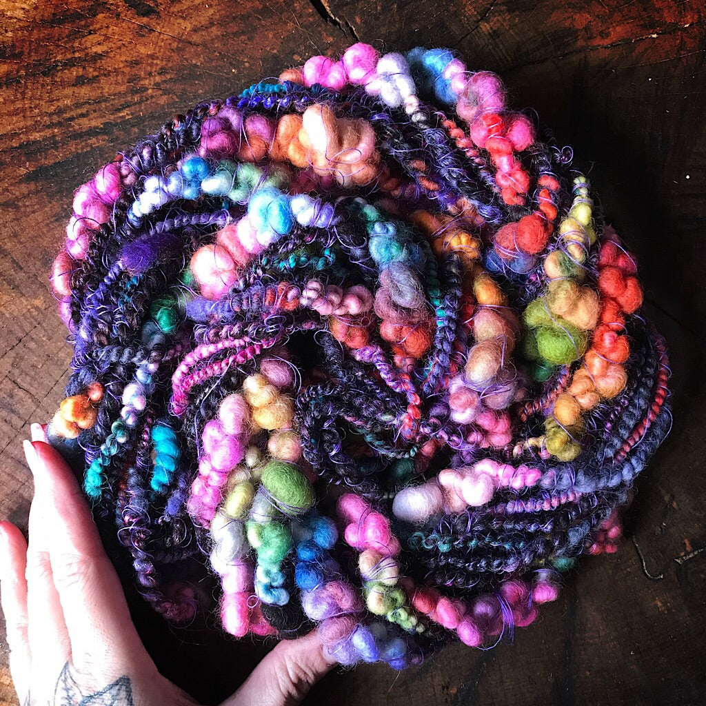 Black rainbow art yarn