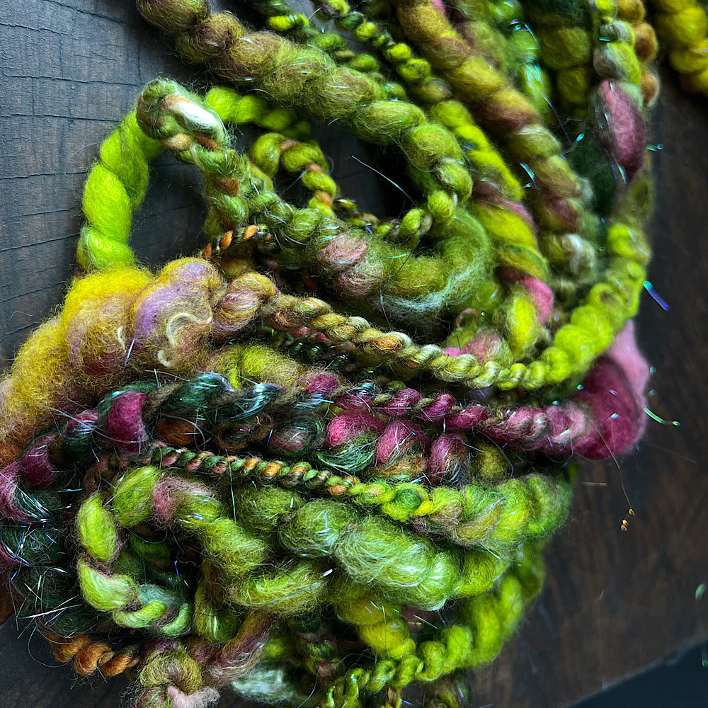 Fluffy spiral in woodland green