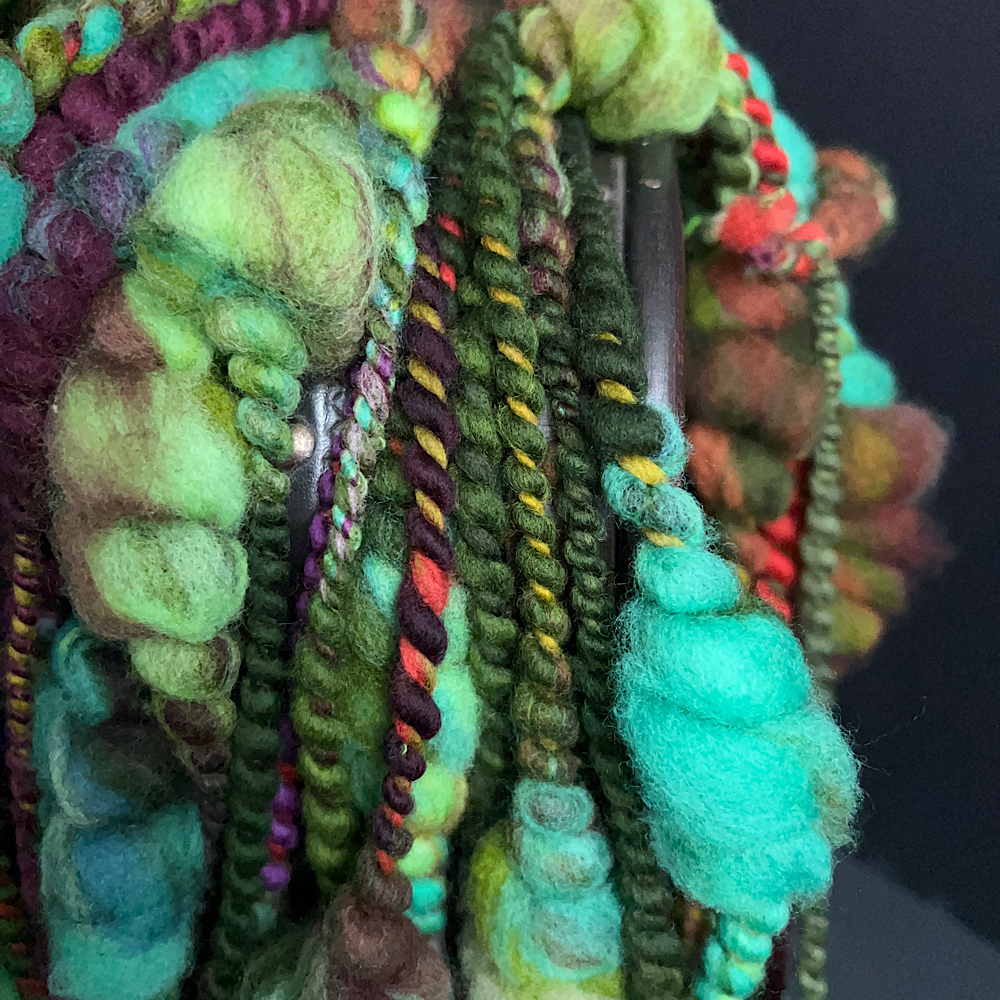 Green thick and thin art yarn