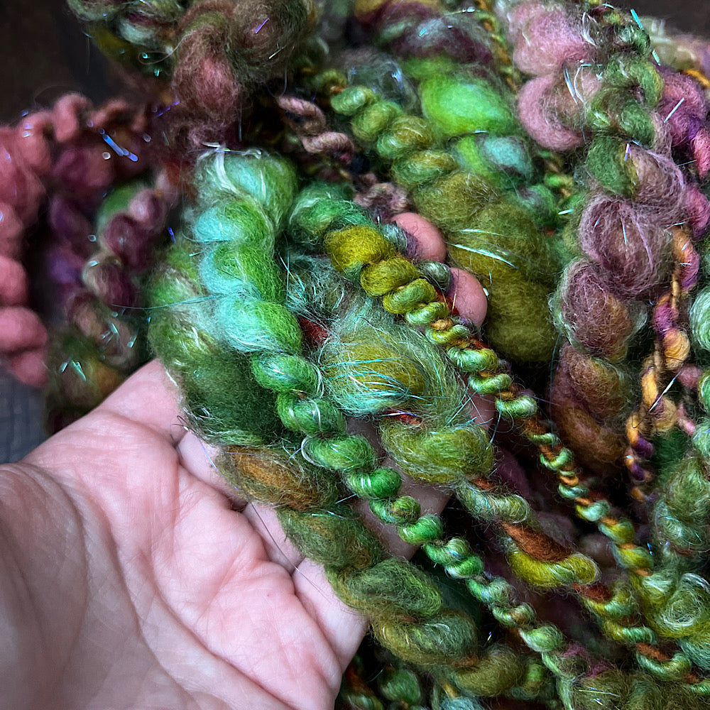 Fluffy spiral in mermaid green