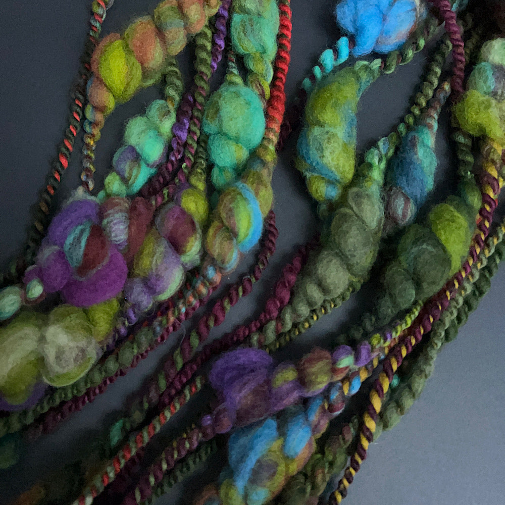 Green thick and thin art yarn