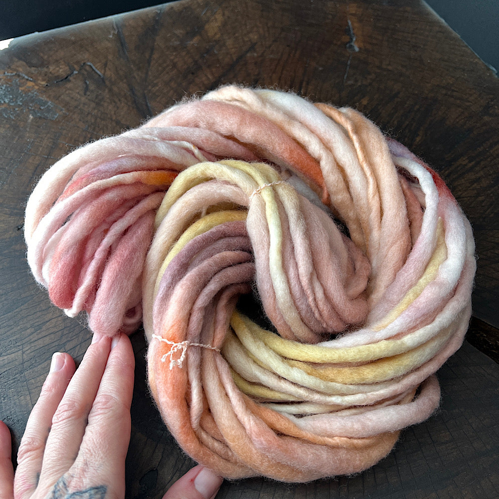 Blurry sunset hand spun single yarn